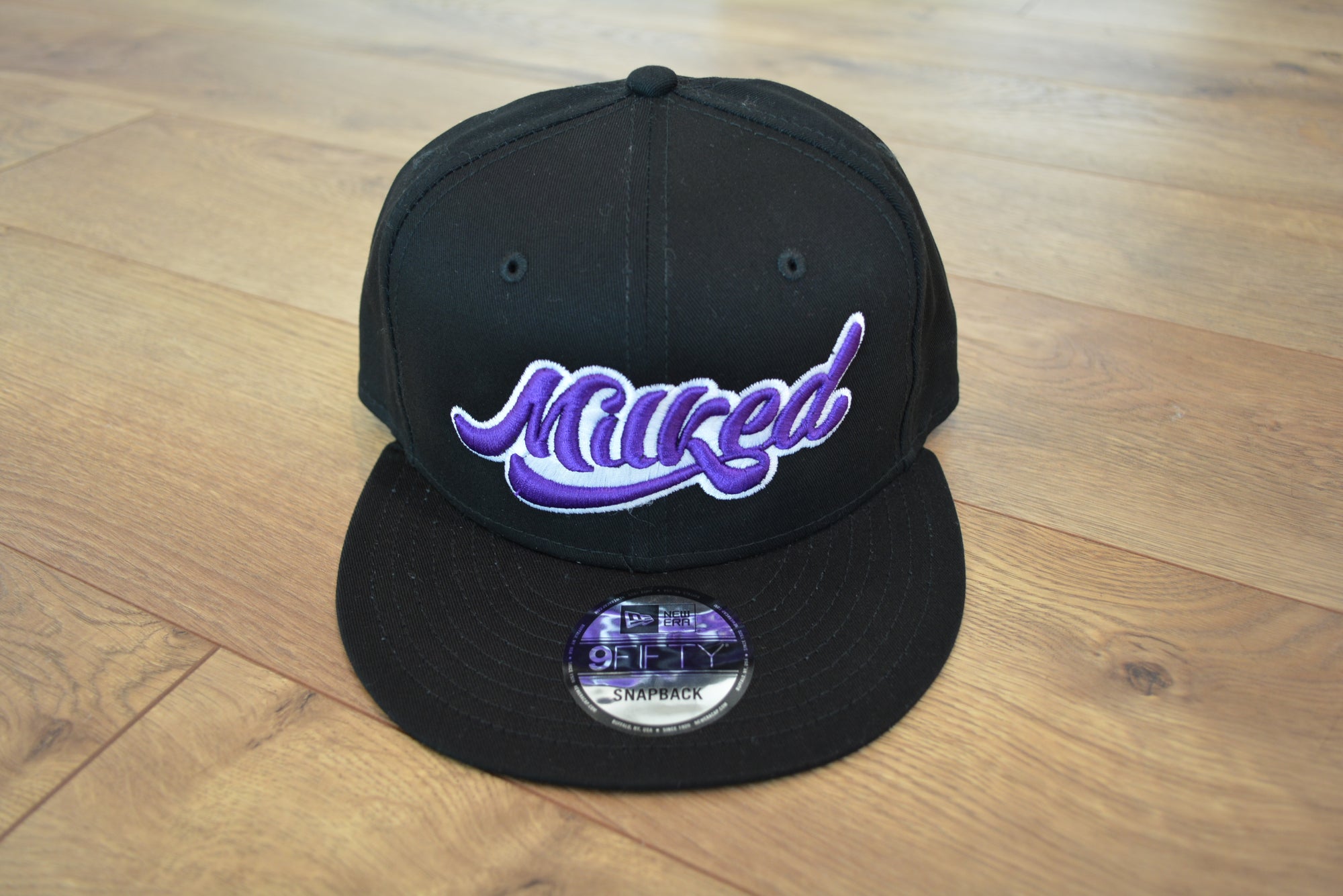 Milked New Era Snap Back Milked Logo